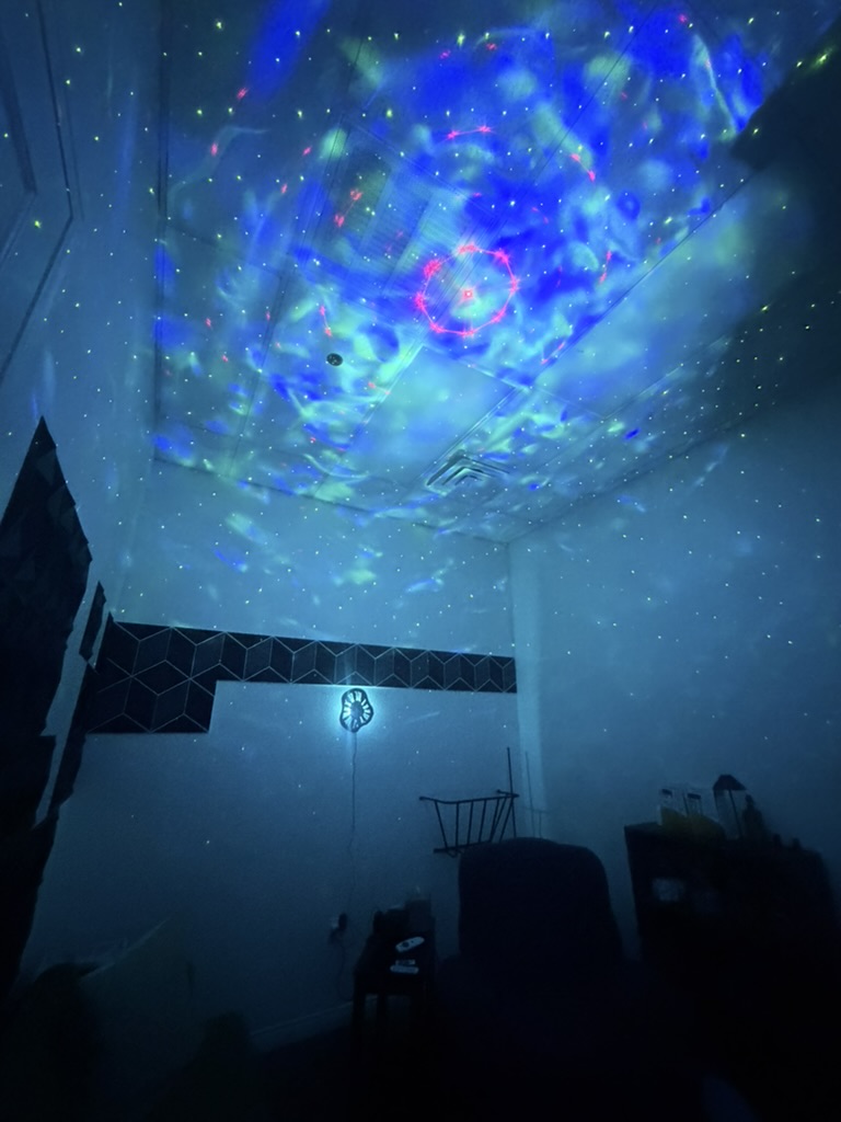 Ketamine treatment room with calming blue and green ceiling lights